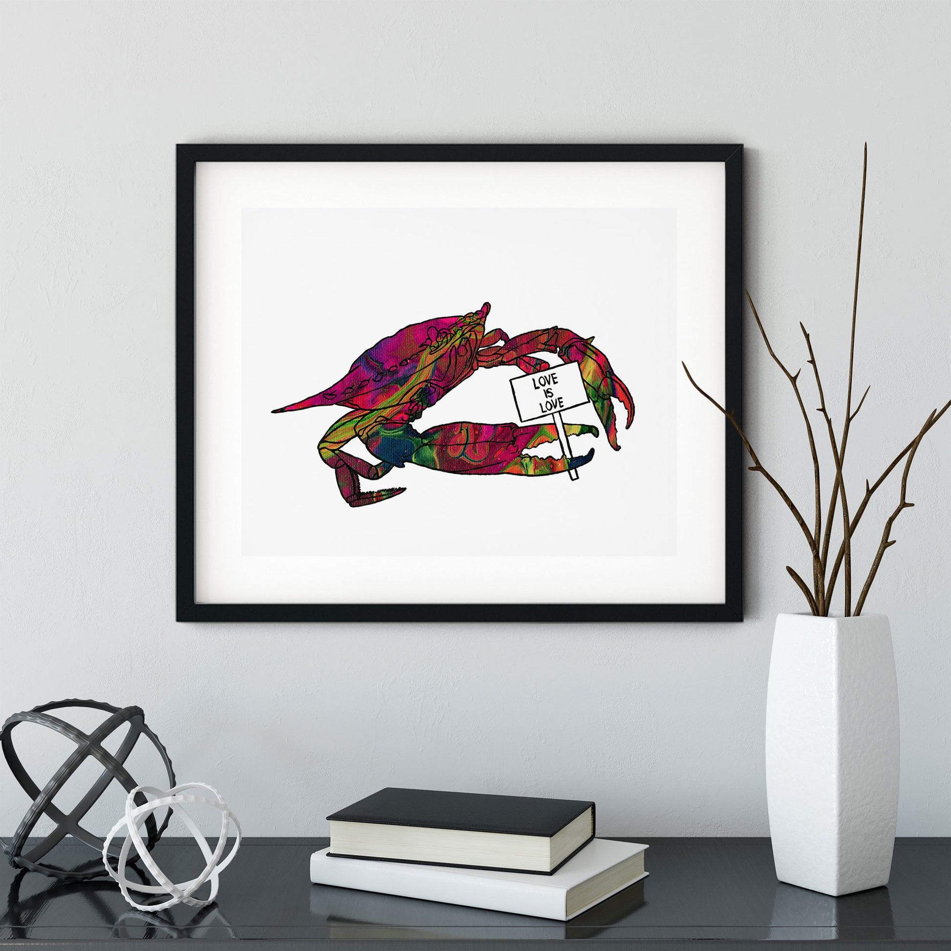 Chesapeake crab holding 'Love Is Love' sign, framed scene - Candid Almond