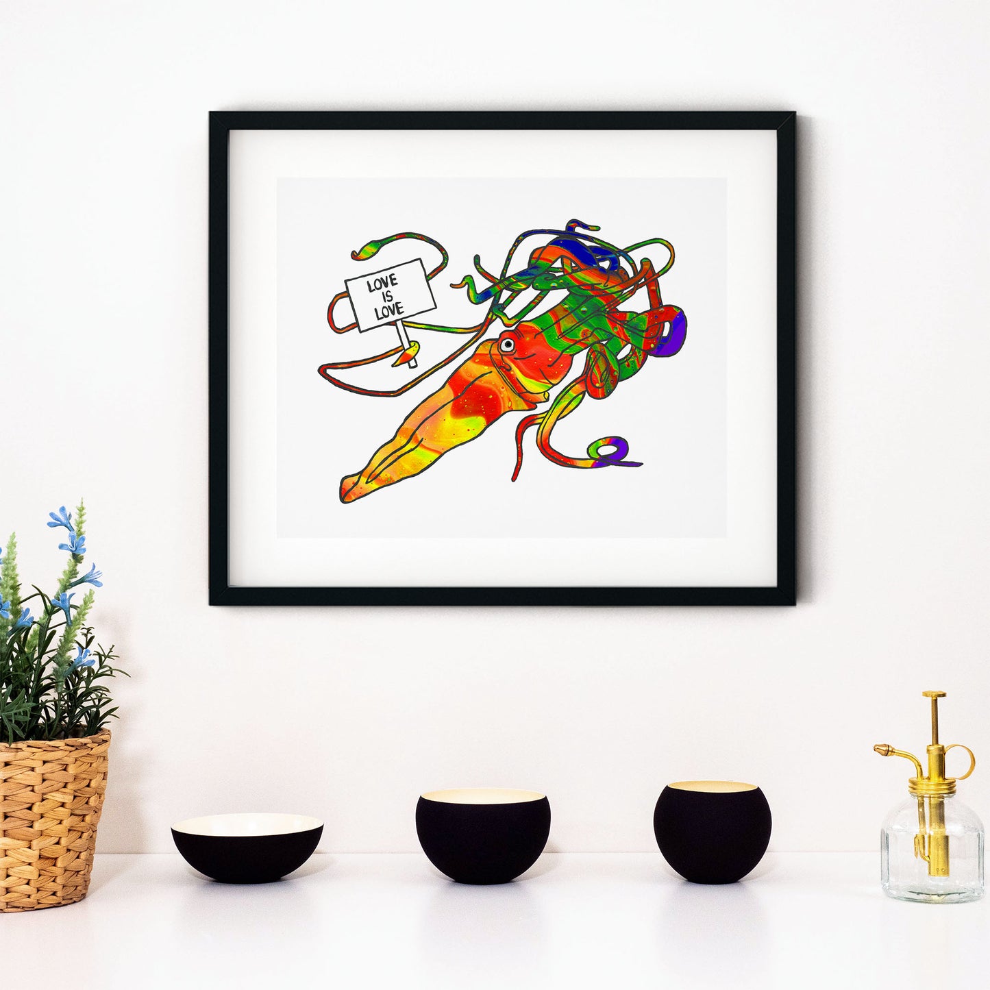 Giant squid holding 'Love Is Love' sign, framed scene - Candid Almond
